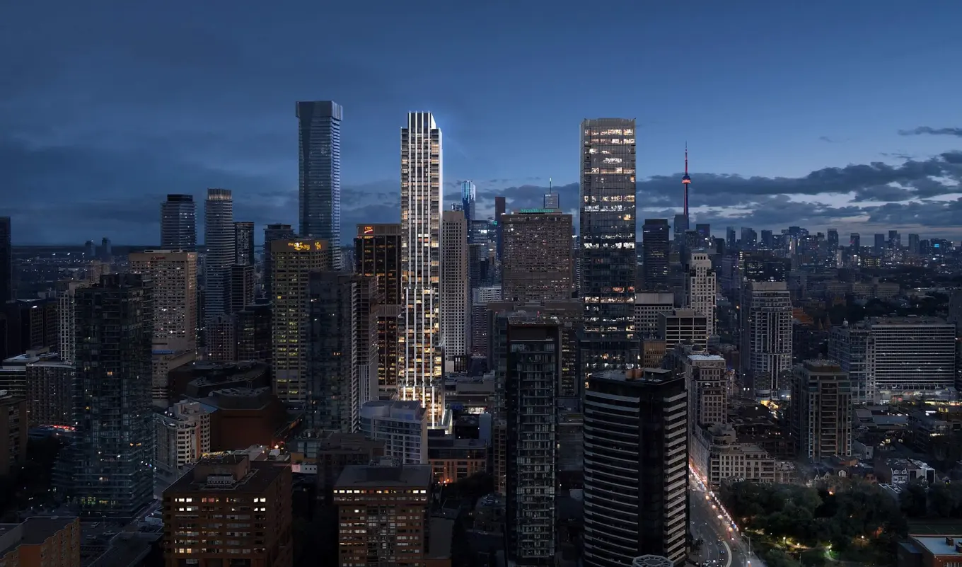 11 Yorkville lit up on the Toronto skyline at dusk